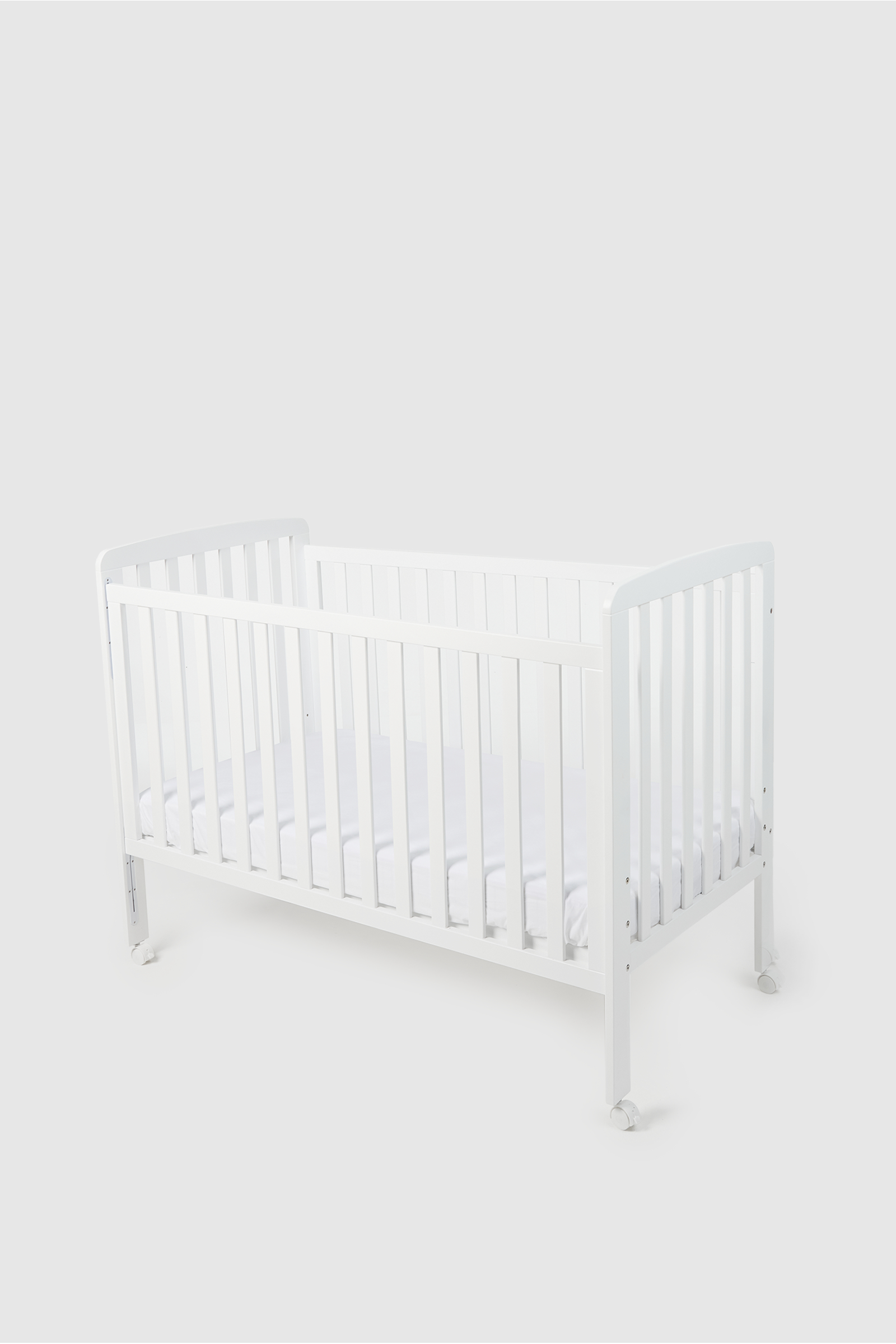 Buy Mothercare Bristol Drop Side Cot with Wheels online Mothercare Kuwait